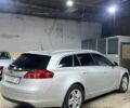 Серый Опель Инсигния, объемом двигателя 1.8 л и пробегом 159 тыс. км за 7999 $, фото 4 на Automoto.ua