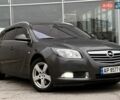 Серый Опель Инсигния, объемом двигателя 2 л и пробегом 246 тыс. км за 6400 $, фото 6 на Automoto.ua