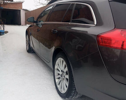 Сірий Опель Інсігнія, об'ємом двигуна 2 л та пробігом 260 тис. км за 6800 $, фото 4 на Automoto.ua