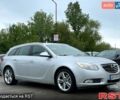 Серый Опель Инсигния, объемом двигателя 2 л и пробегом 255 тыс. км за 6000 $, фото 1 на Automoto.ua