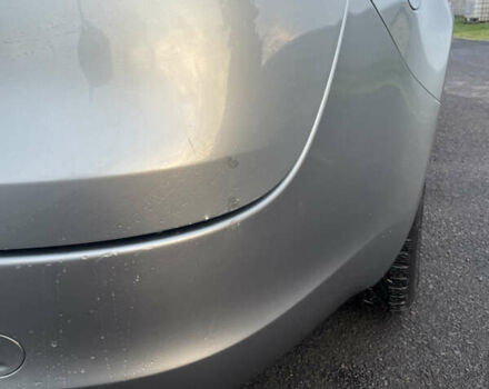 Сірий Опель Інсігнія, об'ємом двигуна 1.96 л та пробігом 301 тис. км за 6500 $, фото 6 на Automoto.ua