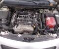 Сірий Опель Інсігнія, об'ємом двигуна 2 л та пробігом 310 тис. км за 6179 $, фото 4 на Automoto.ua