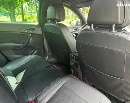 Серый Опель Инсигния, объемом двигателя 2 л и пробегом 282 тыс. км за 10190 $, фото 25 на Automoto.ua