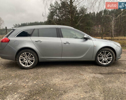 Сірий Опель Інсігнія, об'ємом двигуна 1.96 л та пробігом 203 тис. км за 6999 $, фото 4 на Automoto.ua