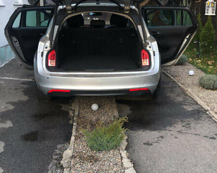 Серый Опель Инсигния, объемом двигателя 2 л и пробегом 260 тыс. км за 8000 $, фото 5 на Automoto.ua