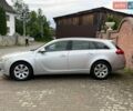 Серый Опель Инсигния, объемом двигателя 2 л и пробегом 315 тыс. км за 4800 $, фото 3 на Automoto.ua