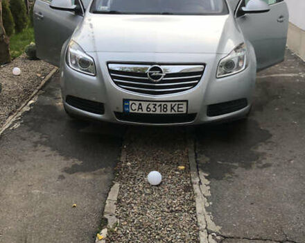 Серый Опель Инсигния, объемом двигателя 2 л и пробегом 260 тыс. км за 8000 $, фото 4 на Automoto.ua