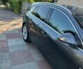Сірий Опель Інсігнія, об'ємом двигуна 2 л та пробігом 330 тис. км за 5998 $, фото 4 на Automoto.ua