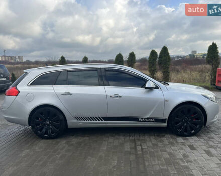 Сірий Опель Інсігнія, об'ємом двигуна 2 л та пробігом 260 тис. км за 8000 $, фото 4 на Automoto.ua