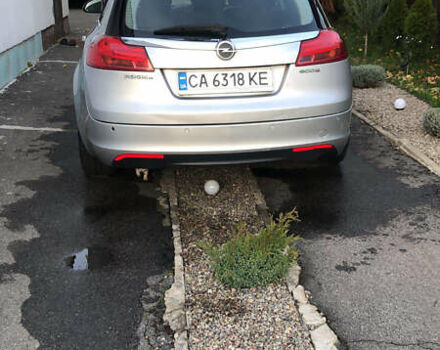 Серый Опель Инсигния, объемом двигателя 2 л и пробегом 260 тыс. км за 8000 $, фото 1 на Automoto.ua