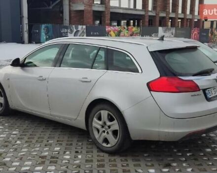 Серый Опель Инсигния, объемом двигателя 1.96 л и пробегом 315 тыс. км за 7900 $, фото 2 на Automoto.ua