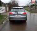 Сірий Опель Інсігнія, об'ємом двигуна 2 л та пробігом 220 тис. км за 8300 $, фото 6 на Automoto.ua