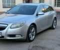 Серый Опель Инсигния, объемом двигателя 1.96 л и пробегом 300 тыс. км за 8050 $, фото 1 на Automoto.ua