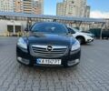 Серый Опель Инсигния, объемом двигателя 2 л и пробегом 329 тыс. км за 7514 $, фото 1 на Automoto.ua