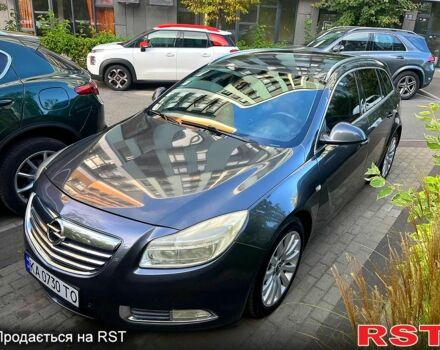 Серый Опель Инсигния, объемом двигателя 2 л и пробегом 31000 тыс. км за 7600 $, фото 4 на Automoto.ua