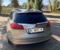 Серый Опель Инсигния, объемом двигателя 1.6 л и пробегом 252 тыс. км за 8950 $, фото 2 на Automoto.ua