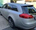 Сірий Опель Інсігнія, об'ємом двигуна 2 л та пробігом 250 тис. км за 9500 $, фото 2 на Automoto.ua