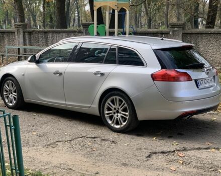 Серый Опель Инсигния, объемом двигателя 2 л и пробегом 256 тыс. км за 8500 $, фото 2 на Automoto.ua