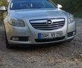 Серый Опель Инсигния, объемом двигателя 2 л и пробегом 175 тыс. км за 8500 $, фото 1 на Automoto.ua