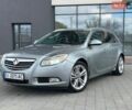 Серый Опель Инсигния, объемом двигателя 2 л и пробегом 293 тыс. км за 6200 $, фото 1 на Automoto.ua