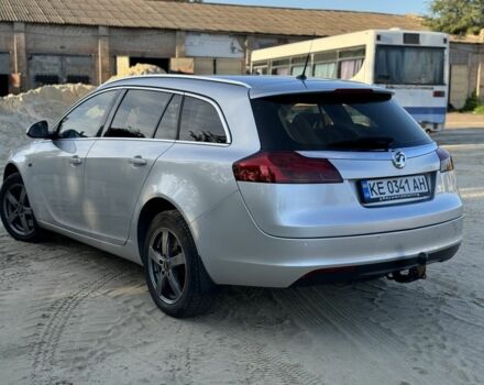 Серый Опель Инсигния, объемом двигателя 2 л и пробегом 260 тыс. км за 6999 $, фото 4 на Automoto.ua