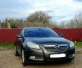 Серый Опель Инсигния, объемом двигателя 2 л и пробегом 211 тыс. км за 7500 $, фото 1 на Automoto.ua