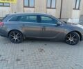 Серый Опель Инсигния, объемом двигателя 2 л и пробегом 412 тыс. км за 3200 $, фото 3 на Automoto.ua
