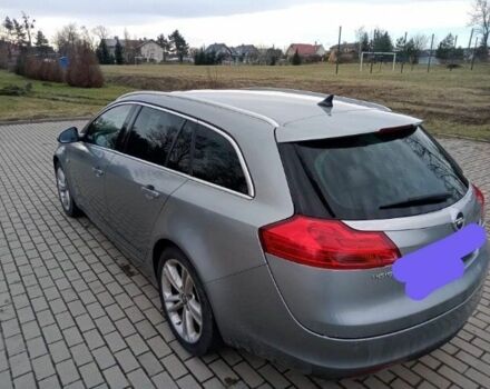 Серый Опель Инсигния, объемом двигателя 2 л и пробегом 300 тыс. км за 8300 $, фото 2 на Automoto.ua