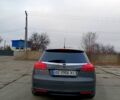 Серый Опель Инсигния, объемом двигателя 2 л и пробегом 210 тыс. км за 7800 $, фото 2 на Automoto.ua