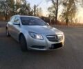 Серый Опель Инсигния, объемом двигателя 2 л и пробегом 177 тыс. км за 10500 $, фото 1 на Automoto.ua