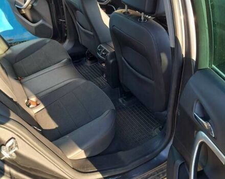 Серый Опель Инсигния, объемом двигателя 2 л и пробегом 150 тыс. км за 8700 $, фото 5 на Automoto.ua