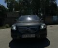 Сірий Опель Інсігнія, об'ємом двигуна 2 л та пробігом 260 тис. км за 9000 $, фото 1 на Automoto.ua