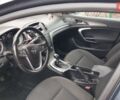 Серый Опель Инсигния, объемом двигателя 2 л и пробегом 260 тыс. км за 9900 $, фото 6 на Automoto.ua
