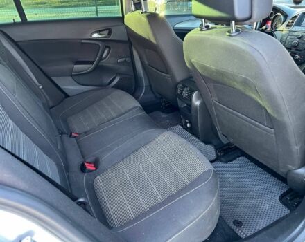 Серый Опель Инсигния, объемом двигателя 2 л и пробегом 323 тыс. км за 6300 $, фото 4 на Automoto.ua