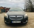 Серый Опель Инсигния, объемом двигателя 2 л и пробегом 320 тыс. км за 7850 $, фото 1 на Automoto.ua
