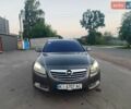 Серый Опель Инсигния, объемом двигателя 1.96 л и пробегом 410 тыс. км за 7500 $, фото 1 на Automoto.ua