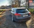 Серый Опель Инсигния, объемом двигателя 2 л и пробегом 150 тыс. км за 8700 $, фото 1 на Automoto.ua