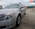 Серый Опель Инсигния, объемом двигателя 1.96 л и пробегом 383 тыс. км за 6300 $, фото 4 на Automoto.ua