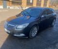 Серый Опель Инсигния, объемом двигателя 2 л и пробегом 310 тыс. км за 8500 $, фото 1 на Automoto.ua