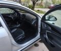 Серый Опель Инсигния, объемом двигателя 2 л и пробегом 301 тыс. км за 4600 $, фото 14 на Automoto.ua