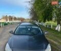 Серый Опель Инсигния, объемом двигателя 1.96 л и пробегом 297 тыс. км за 6300 $, фото 4 на Automoto.ua