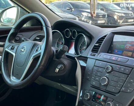 Серый Опель Инсигния, объемом двигателя 2 л и пробегом 213 тыс. км за 9990 $, фото 3 на Automoto.ua