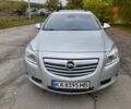 Серый Опель Инсигния, объемом двигателя 2 л и пробегом 313 тыс. км за 6229 $, фото 1 на Automoto.ua