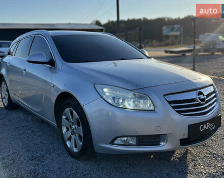 Серый Опель Инсигния, объемом двигателя 2 л и пробегом 323 тыс. км за 6900 $, фото 1 на Automoto.ua