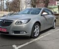 Серый Опель Инсигния, объемом двигателя 2 л и пробегом 239 тыс. км за 7200 $, фото 1 на Automoto.ua