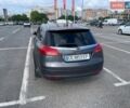 Сірий Опель Інсігнія, об'ємом двигуна 2 л та пробігом 236 тис. км за 8500 $, фото 1 на Automoto.ua