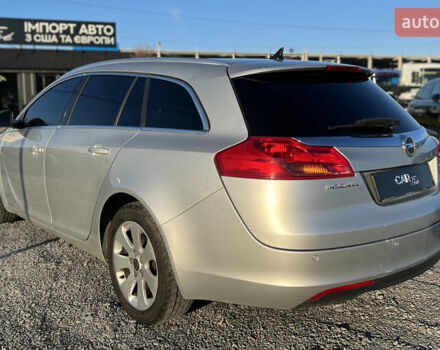 Серый Опель Инсигния, объемом двигателя 2 л и пробегом 323 тыс. км за 6900 $, фото 4 на Automoto.ua