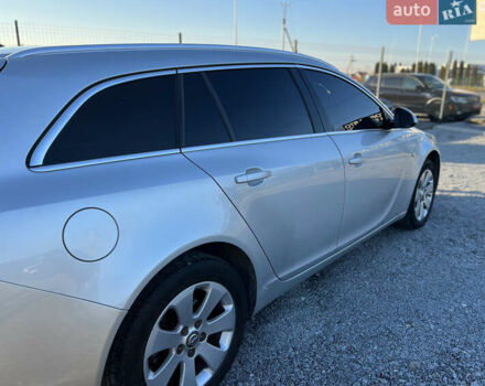 Серый Опель Инсигния, объемом двигателя 2 л и пробегом 323 тыс. км за 6900 $, фото 7 на Automoto.ua