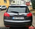 Серый Опель Инсигния, объемом двигателя 2 л и пробегом 160 тыс. км за 5600 $, фото 3 на Automoto.ua