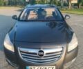Сірий Опель Інсігнія, об'ємом двигуна 1.96 л та пробігом 260 тис. км за 7600 $, фото 8 на Automoto.ua